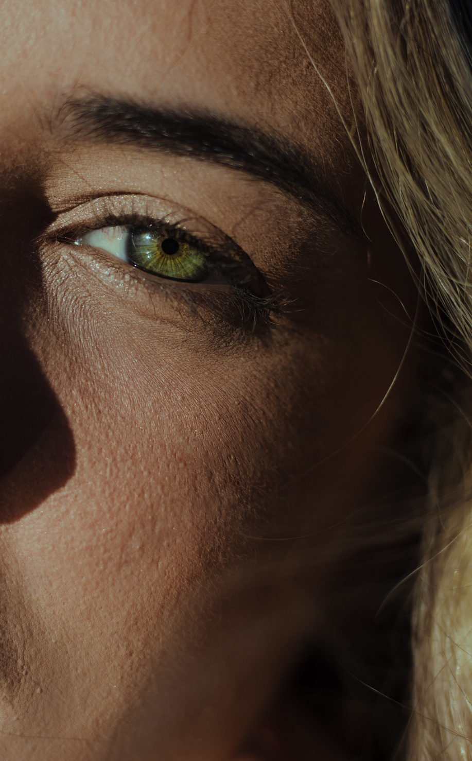 Close Up Photo of Woman's Face