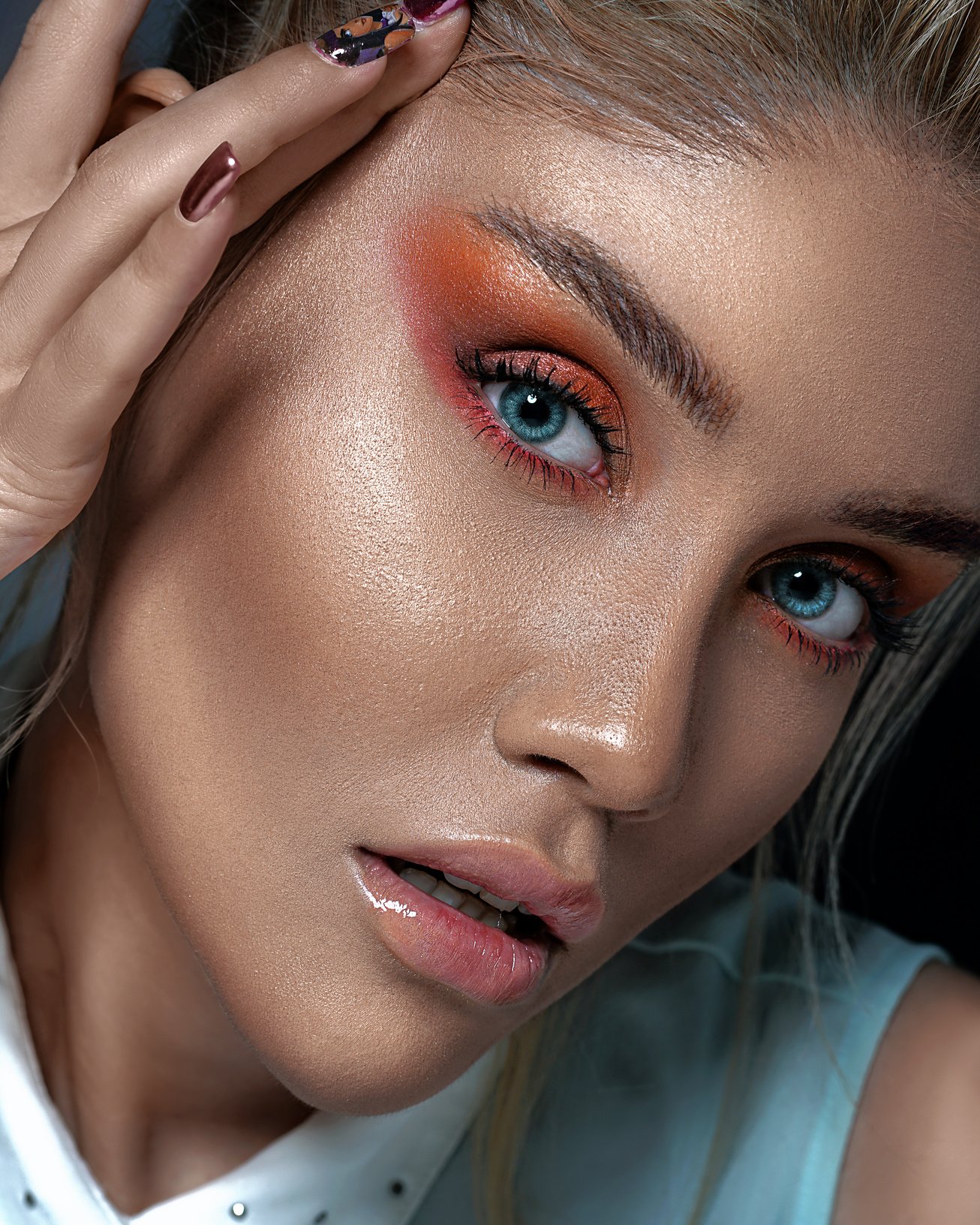 A Close-up Shot of a Woman with Eye Makeup